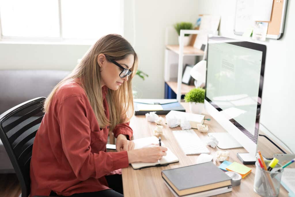 Woman typing on the computer