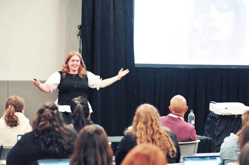 Ahava speaking in front of a group