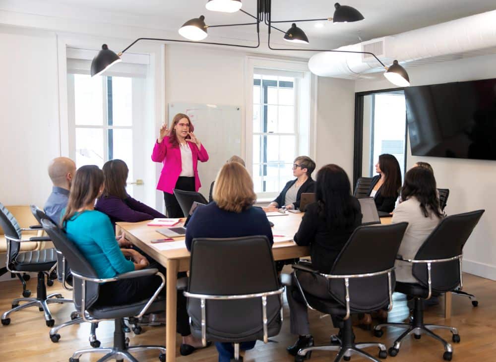 Aha Media Group team meeting led by founder Ahava Leibtag